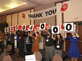 The final figure is unveiled for the 2014 United Way campaign during the touchdown breakfast at the Ambassador Conference Resort on Friday morning. The campaign covered 11 weeks. (Michael Lea/The Whig-Standard)