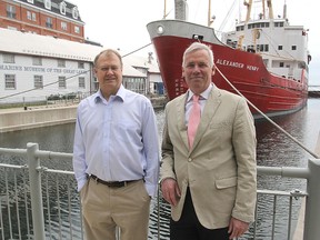 Marine Museum of the Great Lakes board chairman Christopher West, right, with museum manager Doug Cowie, is hoping the new city council will be agreeable to a partnership between the two parties to prevent the land on which the museum sits from going up for public tender. (Michael Lea/Whig-Standard file photo)