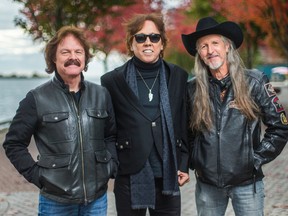 The Doobie Brothers - Tom Johnston (from left), John McFee and Pat Simmons pose for a photo in downtown Toronto, Ont. on Thursday October 30, 2014. Ernest Doroszuk/QMI Agency