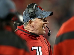 Louisville Cardinals coach Bobby Petrino shouts from the sidelines during NCAA football action against the Florida State Seminoles at Papa John's Cardinal Stadium on October 30, 2014 in Louisville, Kentucky.  (Andy Lyons/Getty Images/AFP)