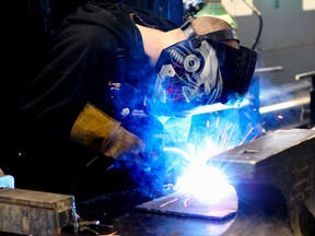 A man welding. (Claire Theobald/Edmonton Sun File Photo)