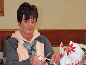 Vulcan resident Sandy Fulton, a member of the Vulcan and District Chamber of Commerce, volunteered to help run the gift wrapping station at the Vulcan Lodge Hall, where the inaugural Black Friday bazaar was held. Simon Ducatel, Vulcan Advocate