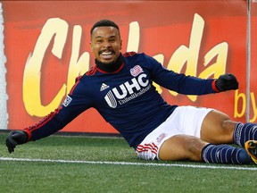 New England Revolution forward Charlie Davies (9) celebrates his goal against the against the New York Red Bulls during the first half of the Eastern Conference Championship at Gillette Stadium on Nov 29, 2014 in Foxborough, MA, USA. (Winslow Townson/USA TODAY Sports)