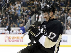 Pittsburgh Penguins left wing Blake Comeau (17) reacts after scoring a goal against the New York Islanders during the first period at the CONSOL Energy Center on Nov 21, 2014 in Pittsburgh, PA, USA. (Charles LeClaire/USA TODAY Sports)