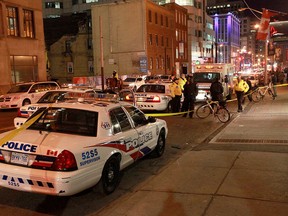 Emergency crews at the scene of a double stabbing around 3 a.m. at Peter and Adelaide Sts. Nov. 30, 2014. (John Hanley photo)