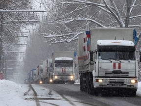 Russian humanitarian trucks are seen in Donetsk, eastern Ukraine, November 30, 2014. According to Russian media, about 60 trucks arrived in Donetsk while another 40 trucks arrived in Luhansk. REUTERS/Antonio Bronic