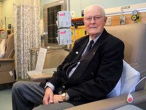 Retired oncologist and hematologist Dr. Douglas MacIntosh sits in a treatment chair in the cancer clinic bearing his name Saturday at Belleville General Hospital. MacIntosh is regarded as the father of oncology in the region.
