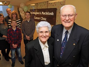 Joined by their family, Catherine and Dr. Douglas MacIntosh stand outside the clinic named in the retired doctor's honour Saturday,  at Belleville General Hospital.  MacIntosh is regarded as the father of oncology in the region.