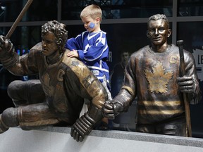 The statues on Legends Row, such as the one of Darryl Sittler, have been a popular stop for photo-taking Maple Leafs fans. (CRAIG ROBERTSON/Toronto Sun files)