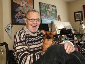 JOHN LAPPA/THE SUDBURY STAR                 
Gregory Maskwa bonds with dog Zoey.
