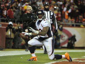 Denver Broncos running back C.J. Anderson (22) celebrates after scoring a touchdown against the Kansas City Chiefs in the first half at Arrowhead Stadium on Nov 30, 2014 in Kansas City, MO, USA. (John Rieger/USA TODAY Sports)