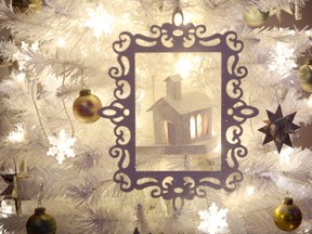 The 'Vintage Glitter' Christmas Tree, designed by Lesley Verdin, on display during the final day of the Festival of Trees at the Shaw Conference Centre, in Edmonton Alta., on Sunday Nov. 30, 2014. David Bloom/QMI Agency