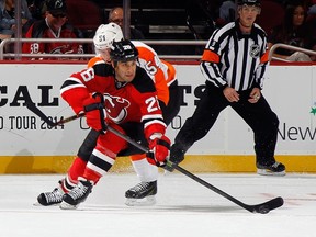 The Devils signed veteran forward Scott Gomez on Monday, and placed forward Travis Zajac on injured reserve. (Bruce Bennett/Getty Images/AFP)