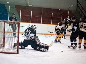 Huskies goaltender Braeden Claringbull let in 18 goals, but still managed to look like the best player on the team making a number of acrobatic saves. Greg Cowan photos/QMI Agency.