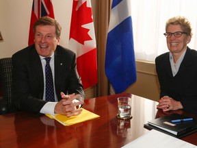 First day in office and new Toronto Mayor John Tory was at the Ontario legislature speaking with Ontario Premier Kathleen Wynne Monday December 1, 2014. (Jack Boland/Toronto Sun)