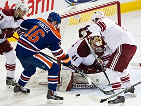 Teddy Purcell is stopped by Coyotes goalie Mike Smith during the second period of Monday's game at Rexall Place. (Codie McLachlan, Edmonton Sun)