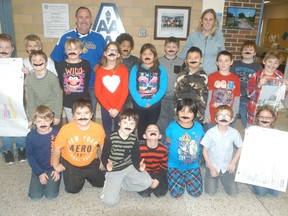 Students at A.A. Wright public school wore mustaches which were donated by a parent on Friday to celebrate Movember. Students at the school raised over $400 that will go towards the Canadian Cancer Society. Miss Stewart's class was the top fundraisers, as they raised $88, so they received a pizza party donated by S&J Pizza and watch a movie donated by Movietime. Miss Parrish's Grade 3-4 class (pictured) was responsible for collecting the money and tracking it.