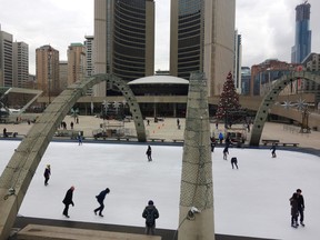 Skaters enjoy the ice rink in Nathan Phillips Square outside Toronto’s city hall. (Jim Fox/Special to QMI Agency)