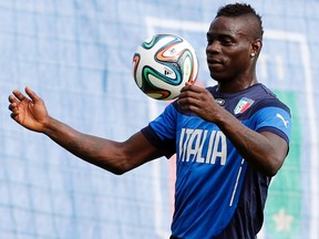 Italy's national soccer player Mario Balotelli controls the ball during a training session at the Portobello training center in Mangaratiba June 18, 2014. Italy will face Costa Rica during their  2014 World Cup Group D soccer match on June 20. REUTERS/Alessandro Garofalo