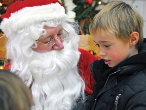 Kyle Rice gets a chance to chat with Santa Claus at the Kinette Club of Tillsonburg's 2010 Breakfast with Santa. The annual breakfast tradition continues this Saturday, Dec. 6th at the Tillsonburg Community Centre, 8:30-11 a.m. The pancake-and-sausage breakfast is $5. (CHRIS ABBOTT/FILE PHOTO)