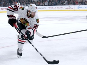 Brandon Saad of the Chicago Blackhawks skates with the puck against the Los Angeles Kings at Staples Center on November 29, 2014. (Stephen Dunn/Getty Images/AFP)