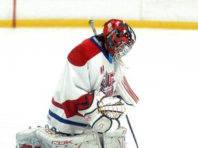 Wallaceburg Community Living Wallaceburg midget Tri-County goalie Tanner Hornick makes a save against South Kent, during a game held at Wallaceburg Memorial Arena on Nov. 30. Hornick had a strong game in net, as the midgets won 7-0.