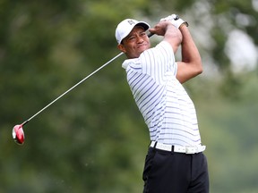 Tiger Woods tees off on the 5th hole during the second round of the 2014 PGA Championship golf tournament at Valhalla Golf Club on Aug 8, 2014. Brian Spurlock-USA TODAY Sports