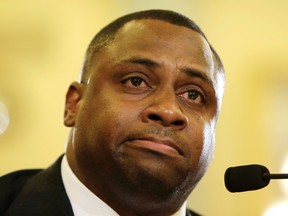 Troy Vincent, Executive Vice President of Football Operations (NFL), and a NFL veteran, becomes emotional while testifying before the Senate Committee on Commerce, Science and Transportation in Washington December 2, 2014. Vincent struggled with his testimony while speaking about his mother who suffered from years of domestic abuse.  REUTERS/Gary Cameron