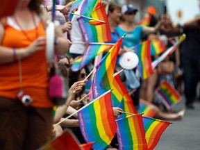 For the first time in almost a decade the Capital Pride Parade returned to Bank Street Sunday, August 25, 2013. Darren Brown/Ottawa Sun/QMI Agency