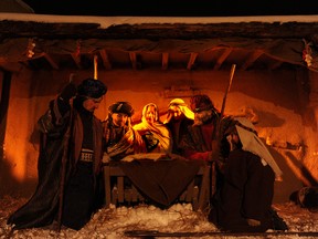 The Nativity Scene performed by members of The Church Of Jesus Christ Of Later Day Saints at Heritage Park in SW Calgary, Alta. From L to R David Simpson, Dallas Smith, Claire Schulz, John Bulger, Greg Glenn and Jared Norris on Thursday December 19, 2013. This is the 50th anniversary of the show. Stuart Dryden/Calgary Sun/QMI Agency