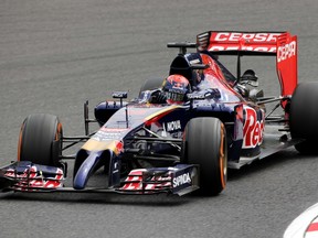 Toro Rosso team's young driver Max Verstappen of the Netherlands speeds during the first practice session at the Formula One Japanese Grand Prix in Suzuka on October 3, 2014. AFP PHOTO/Yuriko Nakao