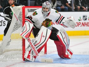 Chicago Blackhawks goalie Corey Crawford (50) defends the goal against the Los Angeles Kings during the first period at Staples Center on November 29, 2014. Gary A. Vasquez-USA TODAY Sports