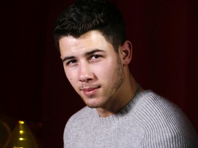 Nick Jonas at the Hospital for Sick Children in Toronto, Ont. on Tuesday December 2, 2014. (Michael Peake, QMI Agency)