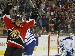 Ottawa Senators Daniel Alfredsson celebrates after scoring against the Toronto Maple Leafs during the first period of game four at The Corel Centre in Ottawa on Wednesday April 14,2004.