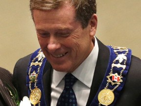 Councillor Rob Ford and Mayor John Tory dat City Hall on Tuesday December 2, 2014. (Craig Robertson/Toronto Sun)