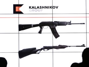 A presentation of the new Kalashnikov logo and AK-47 assault rifle design in Moscow, Russia, Dec. 2, 2014. (VASILY MAXIMOV/AFP)