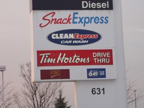 A sign of the times. Gas prices in Ottawa dropped below a dollar a litre for the first time in four years. Two Pioneer stations in Vanier posted prices at 99.9 cents Wednesday afternoon. Corey Larocque/Ottawa Sun