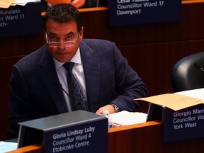 Councillor Giorgio Mammoliti in his seat in City Hall council chambers. (Dave Abel/Toronto Sun)
