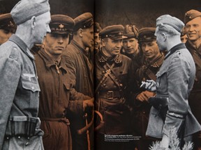 The photograph above appears in the catalogue, at left, titled From War to Victory 1939-1989, which accompanies a travelling exhibit documenting a half-century of Polish history. (DEREK RUTTAN/The London Free Press)