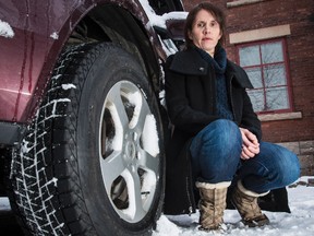 Joanne Lennon experienced a scary event when her front driver side tire fell off her car when the lug nuts came loose three weeks after having her snow tires installed. December 3, 2014. (Errol McGihon/Ottawa Sun)