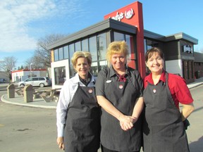 Wendy's restaurant has reopened on London Road in Sarnia following two months of renovations. The location is holding a grant opening Saturday. From left, franchisee Susan Allison, general manager Kristine Pintus, and franchisee Nancy Mooney. (PAUL MORDEN, The Observer)