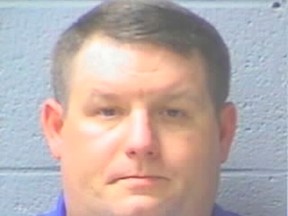 Richard Combs, a former Eutawville, South Carolina police chief, who was indicted by a grand jury in the 2011 shooting death of Bernard Bailey, is shown in this 2011 Orangeburg County Detention Center photo released on December 4, 2014. REUTERS/Orangeburg County Detention Center/Handout