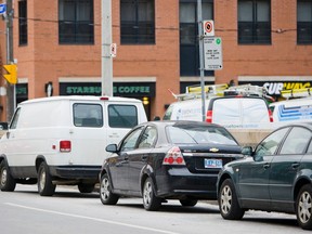 A van in a no-stopping zone along Shuter St. in Toronto. (Ernest Doroszuk/TORONTO SUN)