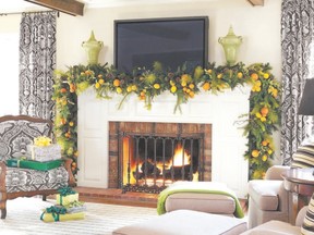 When decorating a fireplace mantel for the holidays, Tobi Fairley likes to remove everything that is not part of the Christmas theme and then ?give the mantel a lush full look.?