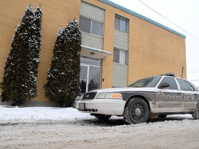 A police car is parked outside 237 Thomas Berry St. in St. Boniface, where Darren Robert Monias and Emery Miles McLeod lived. McLeod faces a 20-year jail sentence for killing and dismembering Monias. (COURTESY STAN MILOSEVIC)