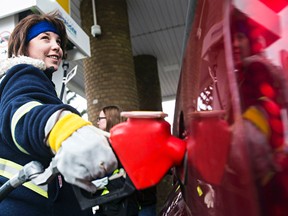 Canadian motorists are saving $40 million every day right now compared to what it cost them to fill up their tanks back in June. (CODIE McLACHLAN/QMI Agency)