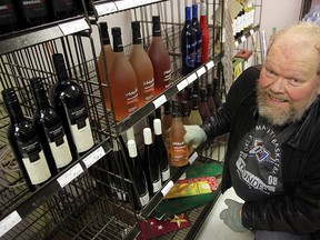 Gary Desrosiers, owner of Brunkild Beverage and Groceries, is seen in his store in Brunkild. Desrosiers will be able to continue to sell alcohol if there is a liquor strike. (Brian Donogh/Winnipeg Sun)