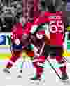 Daniel Alfredsson skates with Erik Karlsson during pre-game warmup with the Ottawa Senators one last time in Ottawa on Thursday December 4, 2014. Errol McGihon/Ottawa Sun/QMI Agency