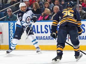 Dustin Byfuglien will move back to the blue-line with the Jets defence corps decimated by injuries.