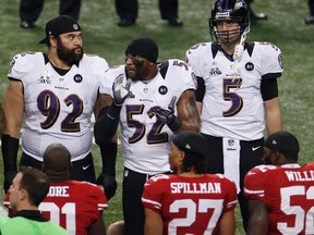 Ravens defensive lineman Haloti Ngata (left) has been suspended for a failed PED test. (USA TODAY SPORTS)